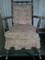 Very old antique cusioned rocking chair