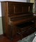 Antique Player Piano with rolls, and Bench