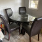 Glass dining table with wooden legs, 4 leather chairs