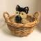 Plush German Shepherd Dog Puppy in a Basket