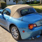 2003 light blue Z4 BMW with beige leather interior and Top