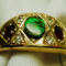 Male/Female Gold Ring embedded w. Rubies, Diamonds, and Ammonite
