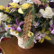 Large basket of artificial flowers