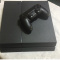 PlayStation 4 500GB console with controller